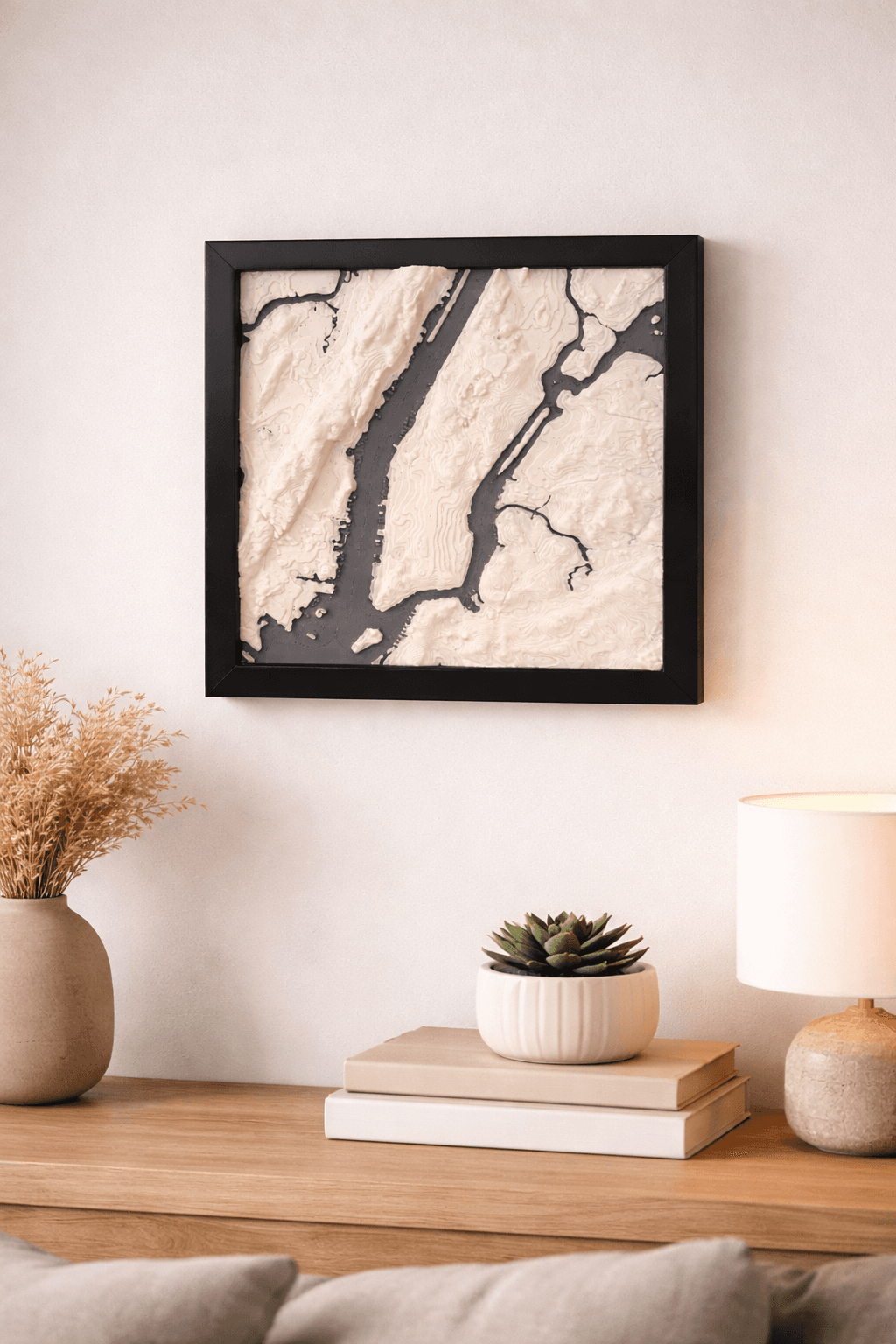 Square terrain map model on a wall shelf